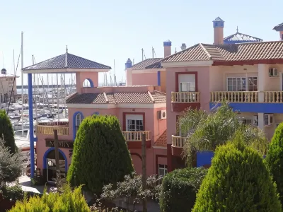 Apartamentos Marina Internacional Hotels near Punta Prima Beach