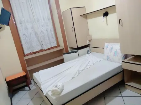 Hotel Central Rosário Отели в г. Жундиаи