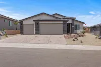 Game Room • Heated Pool & Spa • Fire Pit • Putting Green • Outdoor TV