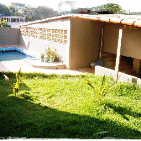 Suítes de Setiba - Hospedaria Oca Ruca