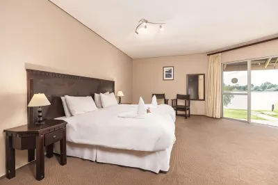 Protea Hotel Zambezi River Lodge Отели в г. 