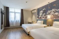 Magnolia Hotel (Qizilou Branch, Lishui University)