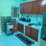 Cozy 2-bedroom apt in charming Santo Domingo Este with WiFi, AC in heart of city - gimnasio
