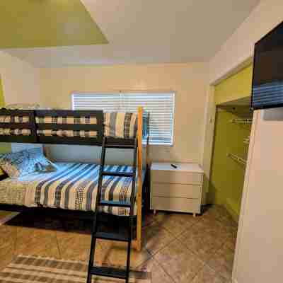 Steps to Beach - Spacious 2BR + Arcade & Resort Backyard Rooms