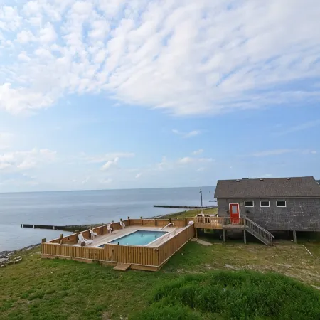 HEATED pool/waterfront/private pier/tennis/hot tub/kayaks/SUPs/8bed 6bath