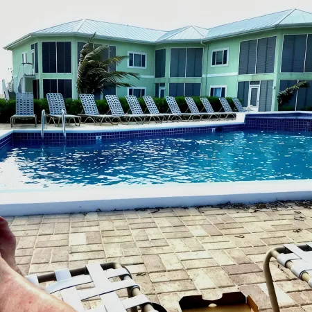 Beachfront Peace!  Awesome top floor condo on Caribbean plus military discount!