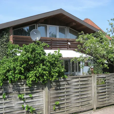 large apartment near the North Sea with conservatory, fireplace, sauna
