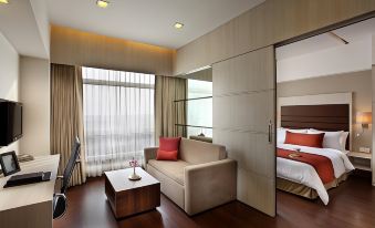 Mahagun Sarovar Portico Suites