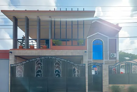 RedDoorz @ R2K Pension House Отели рядом с достопримечательностью «Палаван Уайлдлайф Рескью энд Консервейшен Сентер»