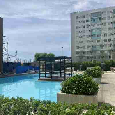 Cozy condo with AC and fitness room in lovely Dumaguete steps from the Ocean Fitness & Recreational Facilities