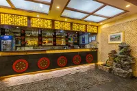 Longnan Sunshine Home Hotel - parkir