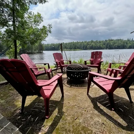 Cozy Adirondack cabin with private dock and kayaks, feet from Adirondack Lake