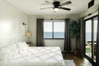Oceanfront ground level condo on a Private Beach in a lovely resort!