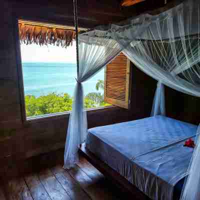 Libertalia Lodge | Exclusive Villa · Private Beach · Ocean Views · Nosy Komba Rooms