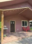 Themed Bear's Den Cabin__nestled in the pines minutes outside of Glacier Park.