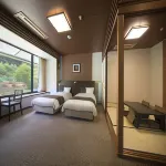 Koga No Okuzashiki Okawara Onsen Kamoshikasou Hotel di Hino
