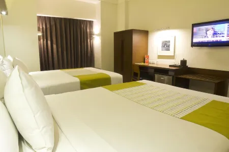 Microtel by Wyndham Acropolis Отели рядом с достопримечательностью «Манила COD I.T. Building»