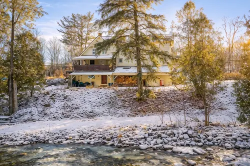 Spacious Farmhouse Estate Overlooking a Babbling Brook