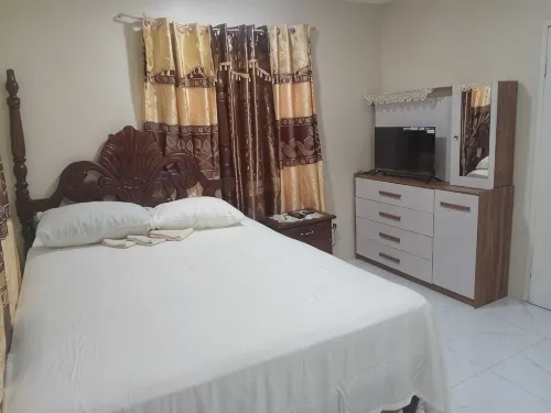Charming 2-bedroom house in Portmore with WiFi, AC