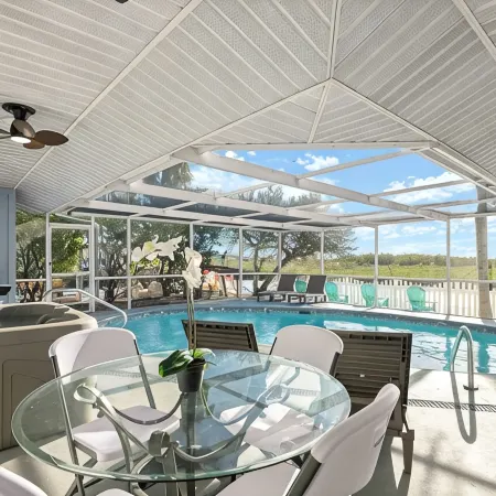 Oasis on the Gulf, screened pool, sunset, kayaks!