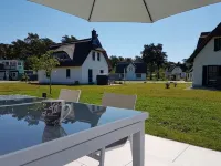 "Käptn 9a" thatched-roof villa with 105 sqm, sauna, fireplace, beach chair, double parking space - Wifi