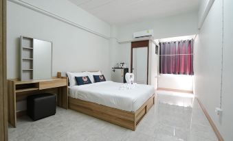 RoomQuest Sps Hotel and Residence