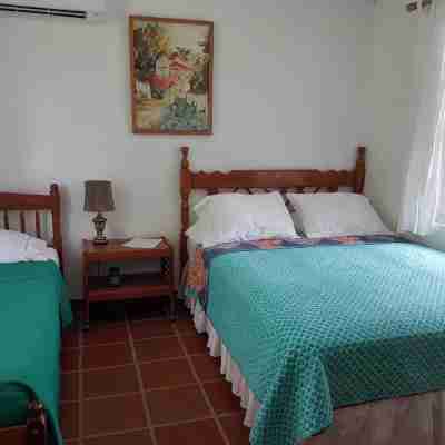 Private villa apartment with pool and within 15 minute walk to 3 beaches. Rooms