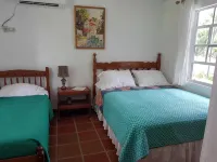 Private villa apartment with pool and within 15 minute walk to 3 beaches.