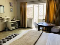 The Hilltop Guesthouse - balcony