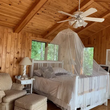 Lakefront cabin with spectacular sunsets included