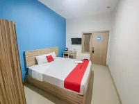 RedDoorz near Jalan Kolonel Haji Burlian Palembang Hotel di Sukodadi