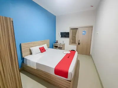 RedDoorz near Jalan Kolonel Haji Burlian Palembang Hotel dekat Masjid Al Ghaniyyurrahman