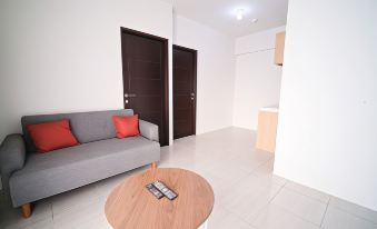 Homey and Comfy 2Br Apartment at Suncity Residence