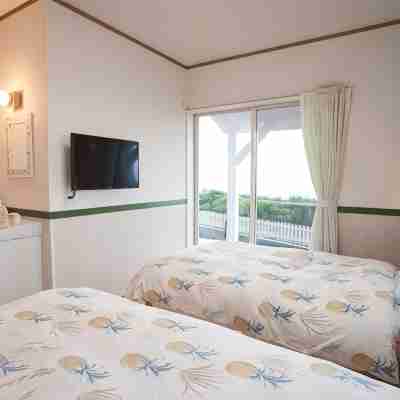 ペンション ルアナハウス Rooms