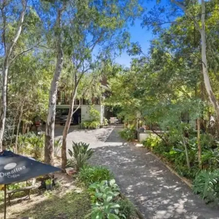 This pet friendly retreat is excellent to relax over looking a "rain forest
