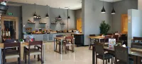 Loumage S Suites and Spa - breakfast