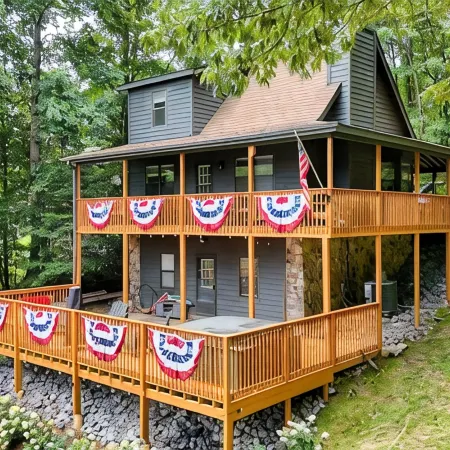 Lakefront Home & Guest House with Two Docks, and Breathtaking Mountain Views!