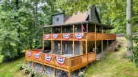 Lakefront Home & Guest House with Two Docks, and Breathtaking Mountain Views!