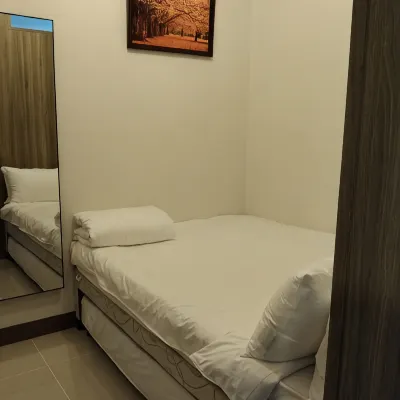 JK Coastal Inn Отели рядом с достопримечательностью «Будльвар Роксас»
