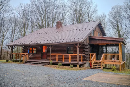 Cozy 4-bedroom cabin in Coudersport with View, Games, Fire Pit & Screen Porch