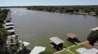 Lakeside Landing is on the Water with Beautiful Views and a Large Deck. - Kitchens
