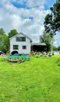 Experience the Charm of a Rustic Lakefront Cottage, Perfect for Year-Round Fun!