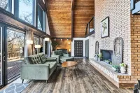 Spacious A-Frame sleeps 25 on 5 wooded acres with a private fishing pond