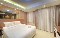 Minimalist 1Br at Gateway Pasteur Apartment by Travelio - Bungalows