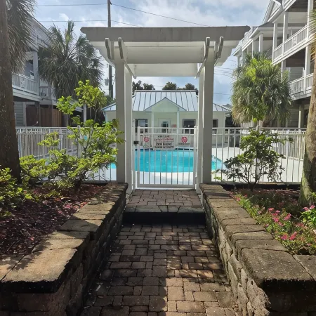 Coastal Comfort: 4-bedroom house with pool and sound access, 3 min walk to beach
