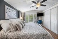 Hot Tub, Fire Pit, Cabana, Covered Patio & Pet-Friendly Riverside Retreat - 4-Star