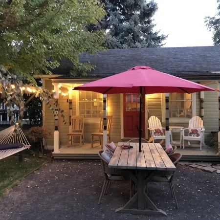 Charming studio cottage on quiet street with beautiful landscaping and gardens.