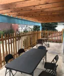 Covered parking/3 bedrooms, sitting room, restroom w/laundry, full kitchen, deck