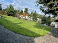 Quiet Haven Hideaway: Hot Tub, Firepit, Playground and Spacious Yard - 4-Star