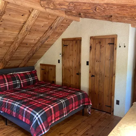 The perfect ADK log cabin getaway on 4 acres and 5 min. to town!